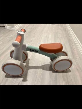 Sereed Toddler Ride-On in Orange & Mint